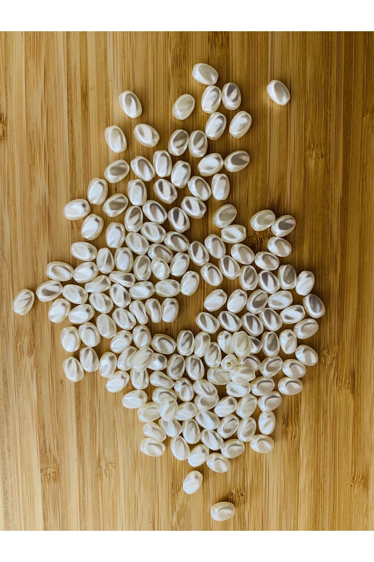 Şekilsiz Barok Takı İnci. Arpa modelli. 25gr. Tahmini 150 adet civarında. Krem.