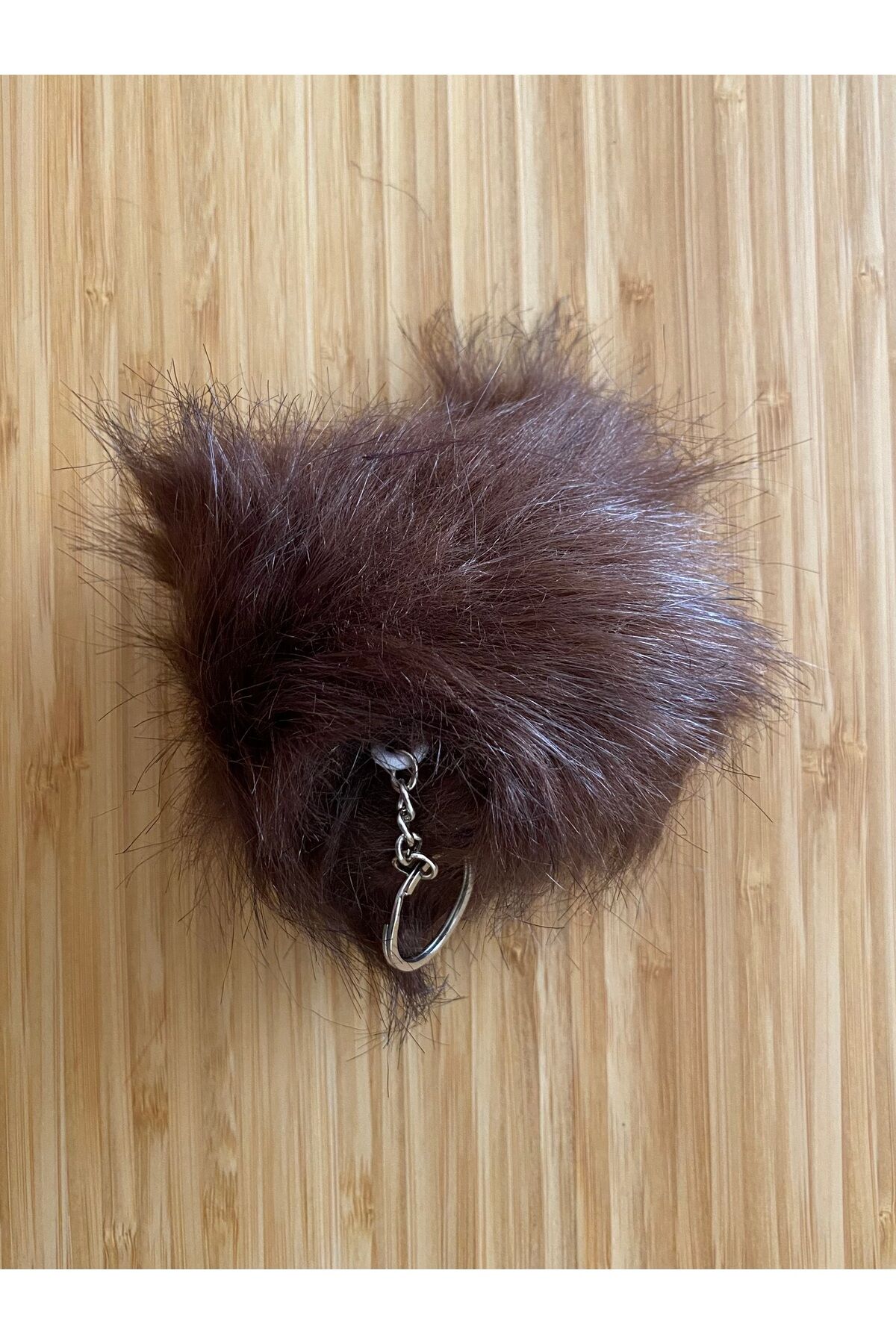 Ponpon Anahtarlık Yarı çapı: 10 cm 1 Adet. Renk: Kahverengi.