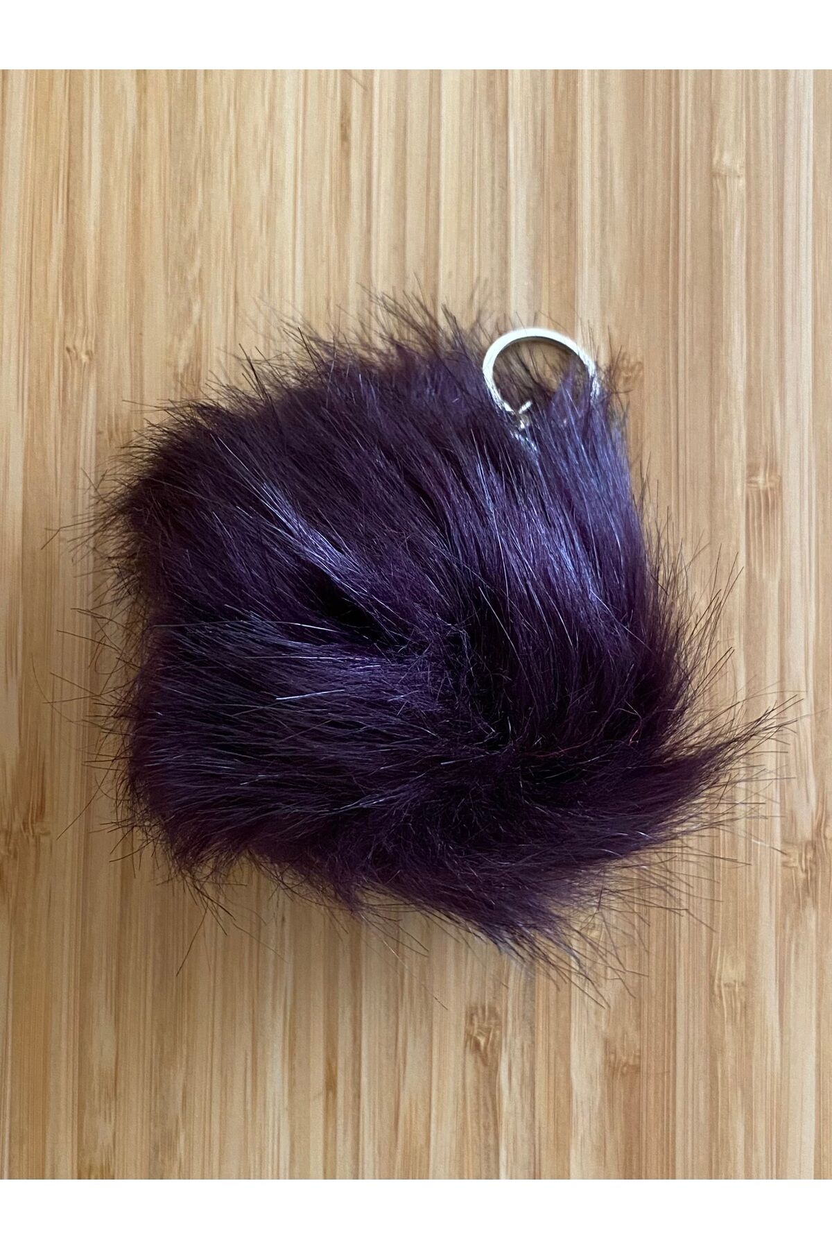 Ponpon Anahtarlık Yarı çapı: 10 cm 1 Adet. Renk: Mürdüm.