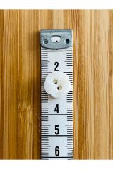 Üstten dikmeli krem bebe düğmesi. 12mm. Papatya.