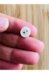 Üstten dikmeli krem bebe düğmesi. 5x11mm .Çanak.