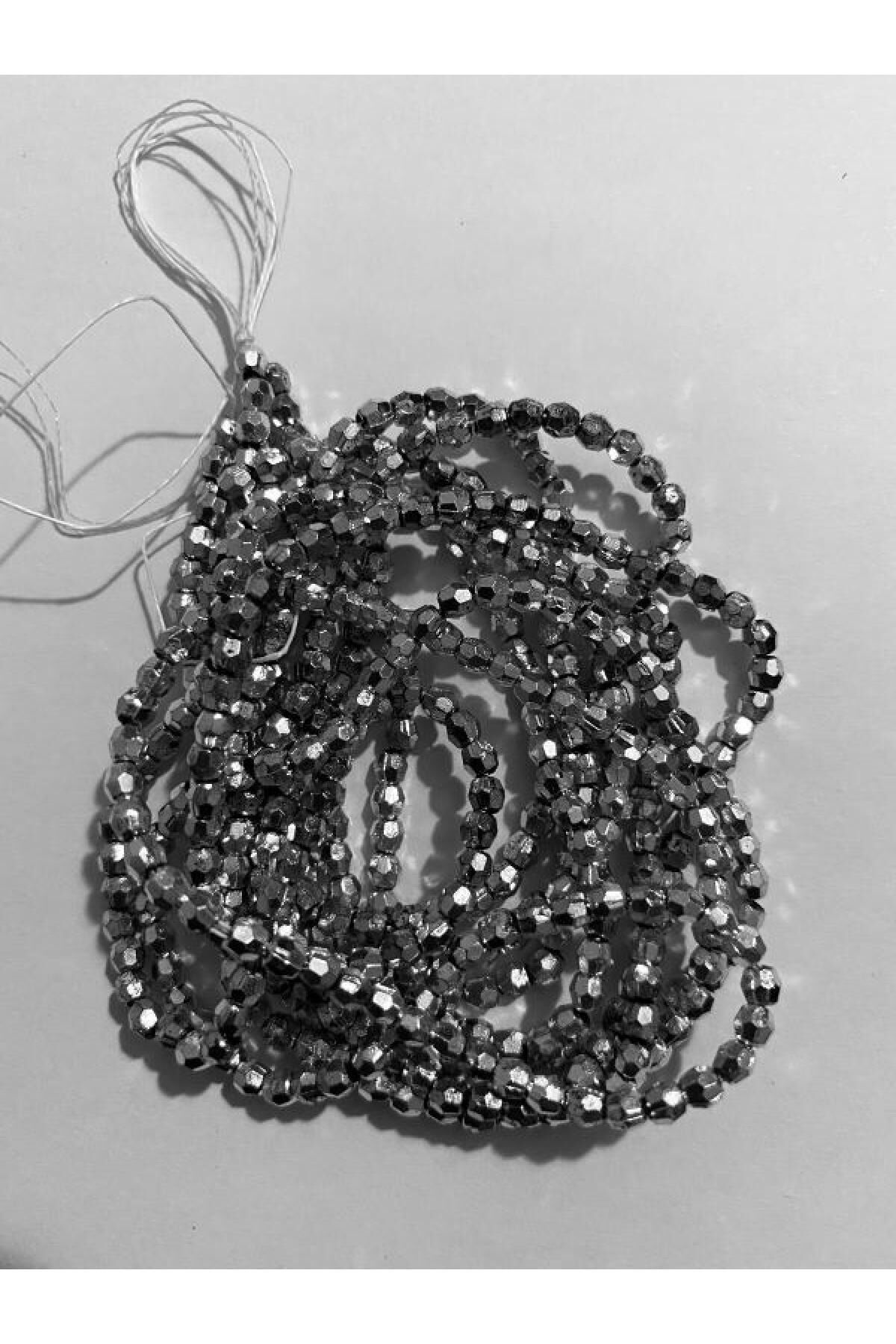 3mm Inci Boncuk 2'li Dizi. Renk: Altıgen Gümüş. Takriben 620-640 Adet.