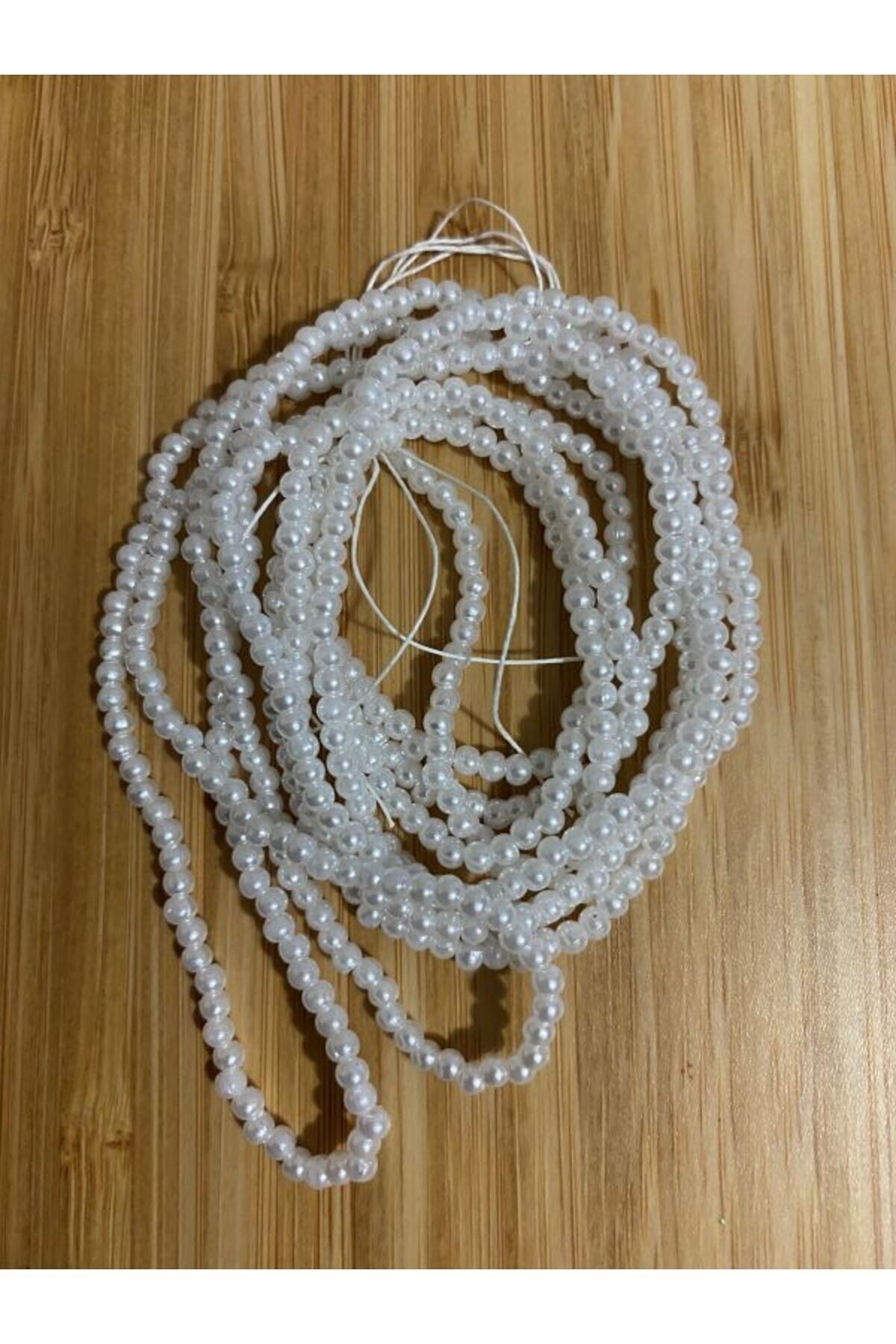 3mm Inci Boncuk 2'li Dizi. Renk: Beyaz. Takriben 620-640 Adet.