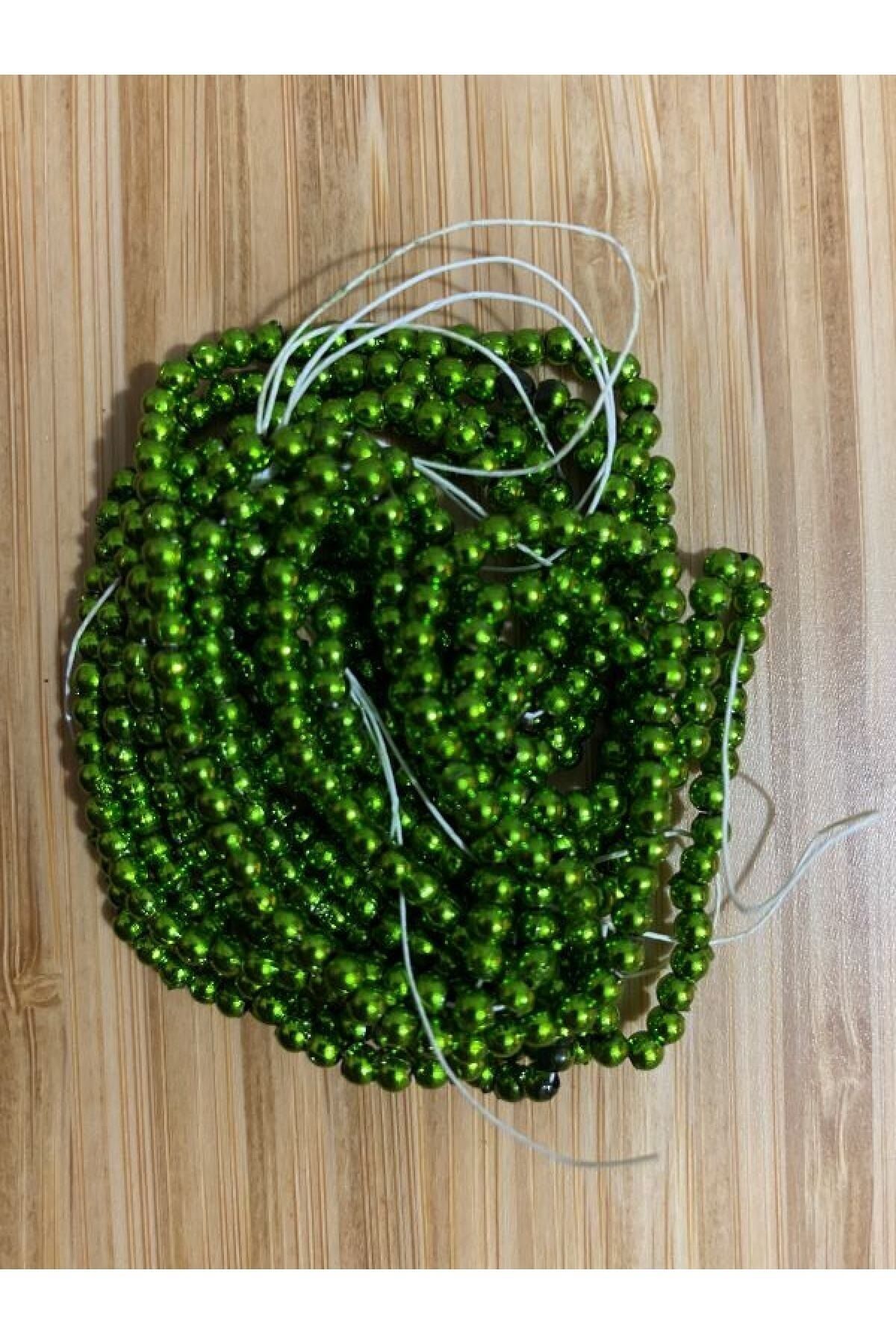 3mm Inci Boncuk 2'li Dizi. Renk: Metalik Yeşil. Takribrn 620-640 Adet.