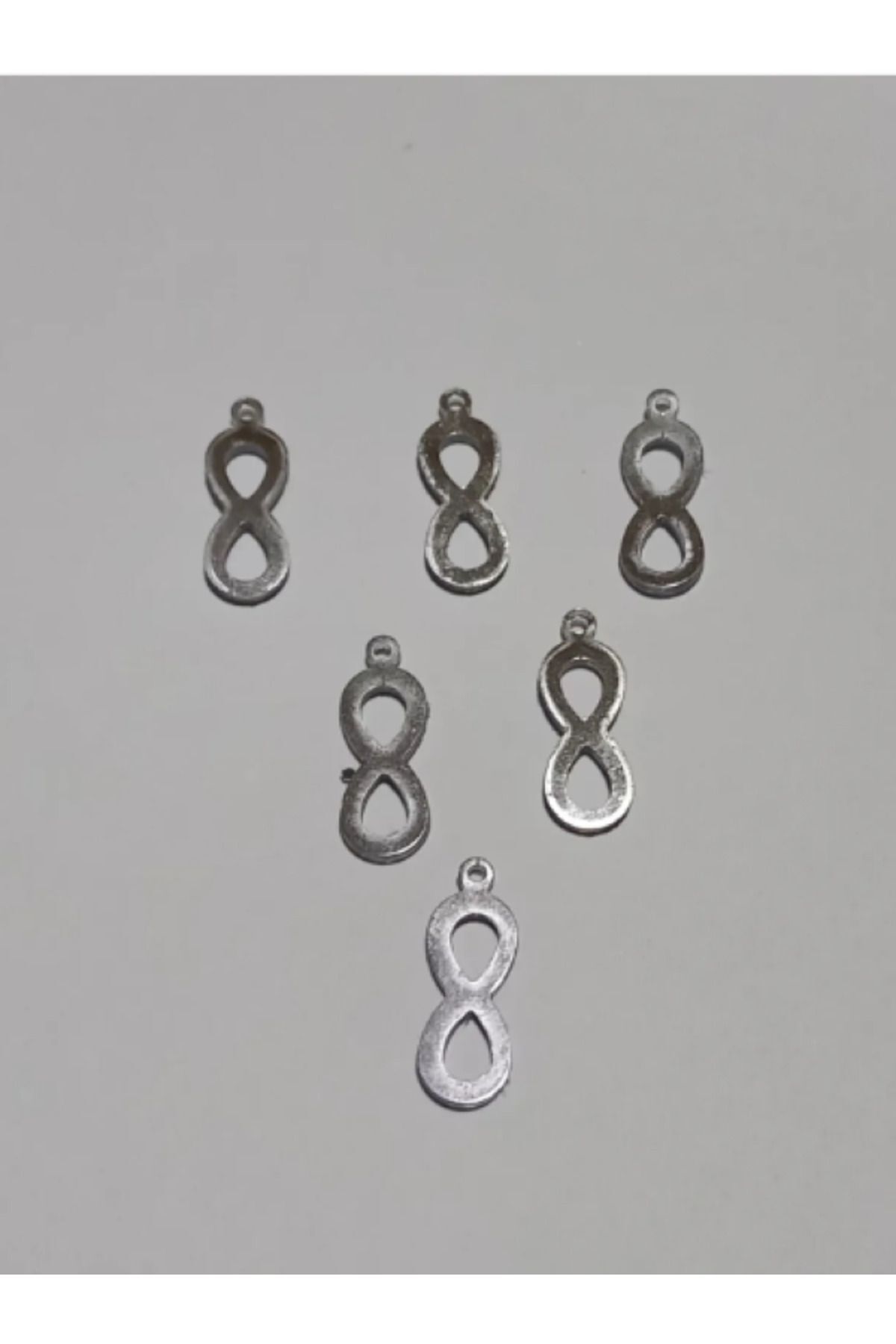 Gümüş Sonsuz Oya, Halhal, Kolye, Bileklik Vs Pleksi Pul 20 Gr. Tahmini Olarak 140 Adet Civarında.