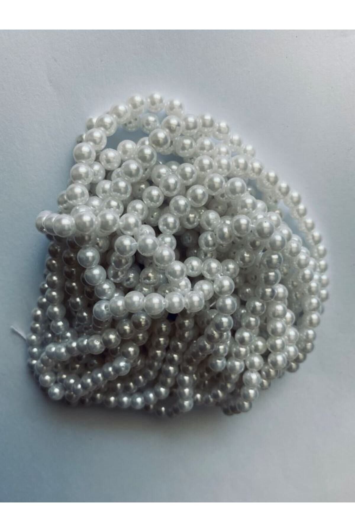 No:6 Beyaz Dizi Plastik Inci. 1 Dizi. Takriben 115-125 Adet