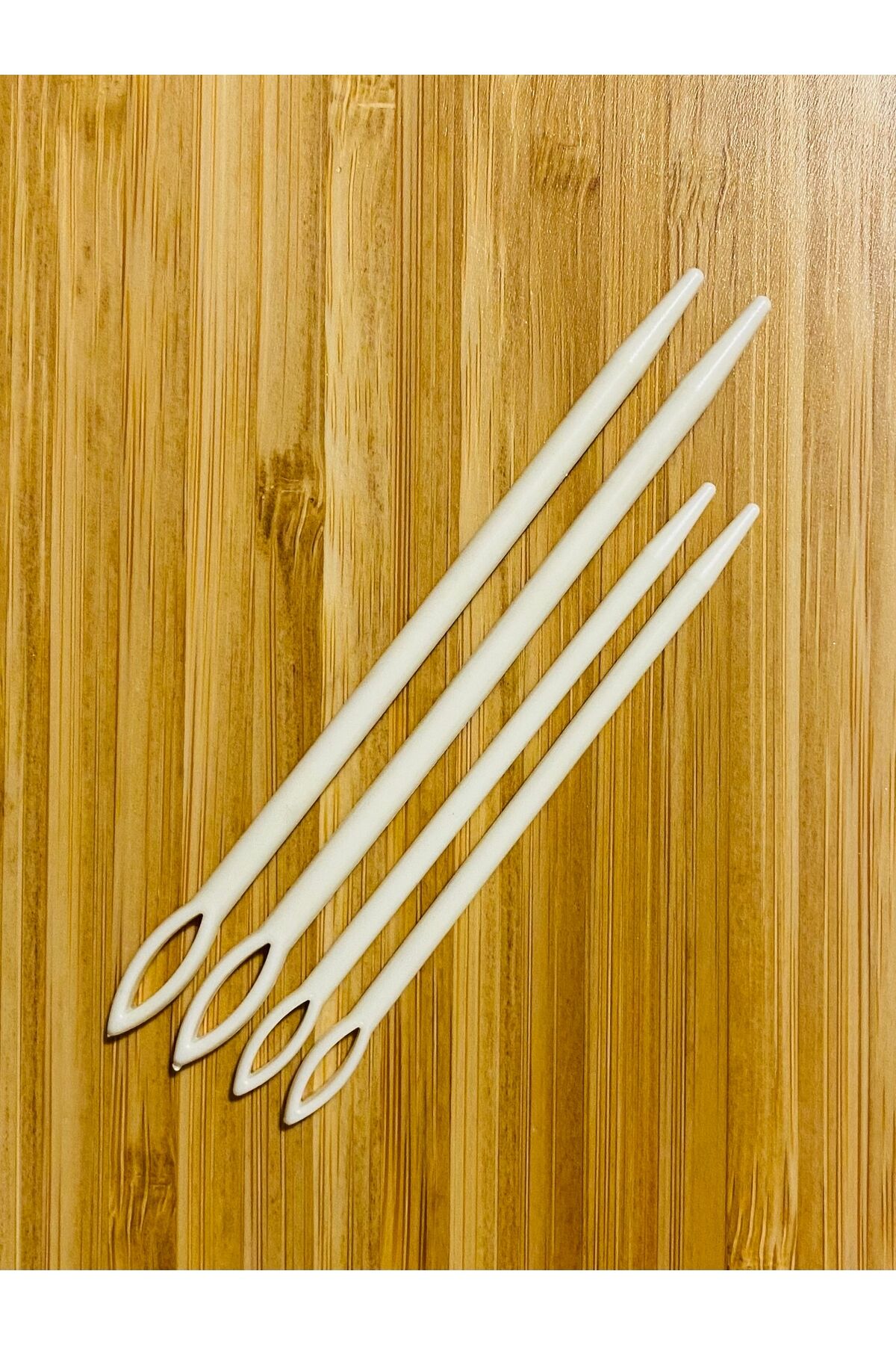 Yün örgü, çuval ağzı dikme, don, paça, etek, kapşon kordon ve lastik  plastik iğne. 4'lü paket.