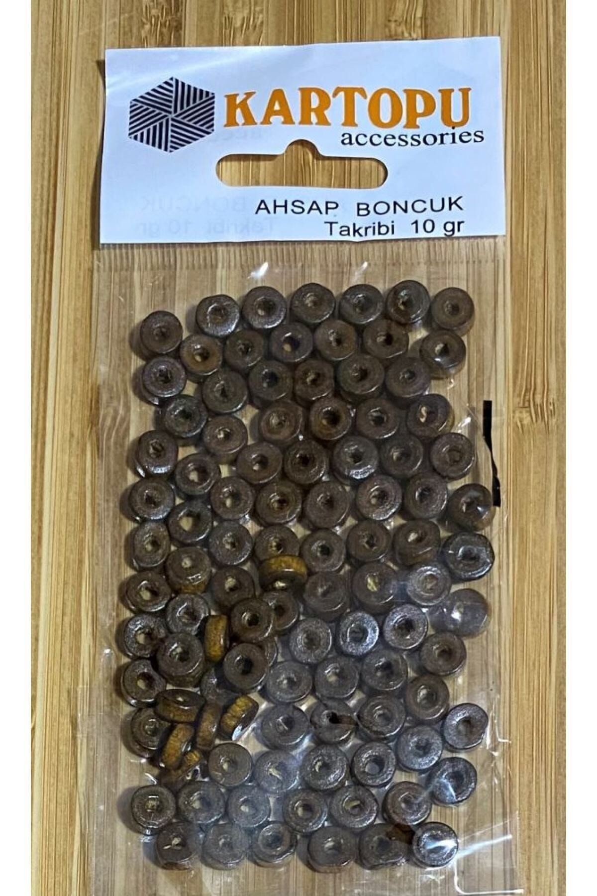 Ahşap Silindir Boncuk Vernikli 3x8mm. 10gr. Takriben 105-110 Adet.