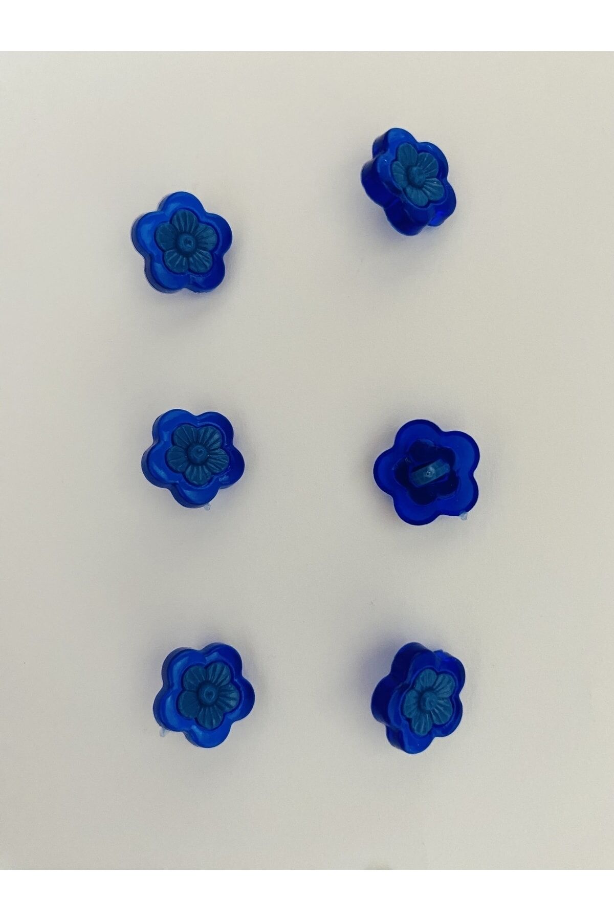 Alttan dikmeli şeffaş plastik papatya bebek düğmesi. 1.5cm. 6'lı paket.