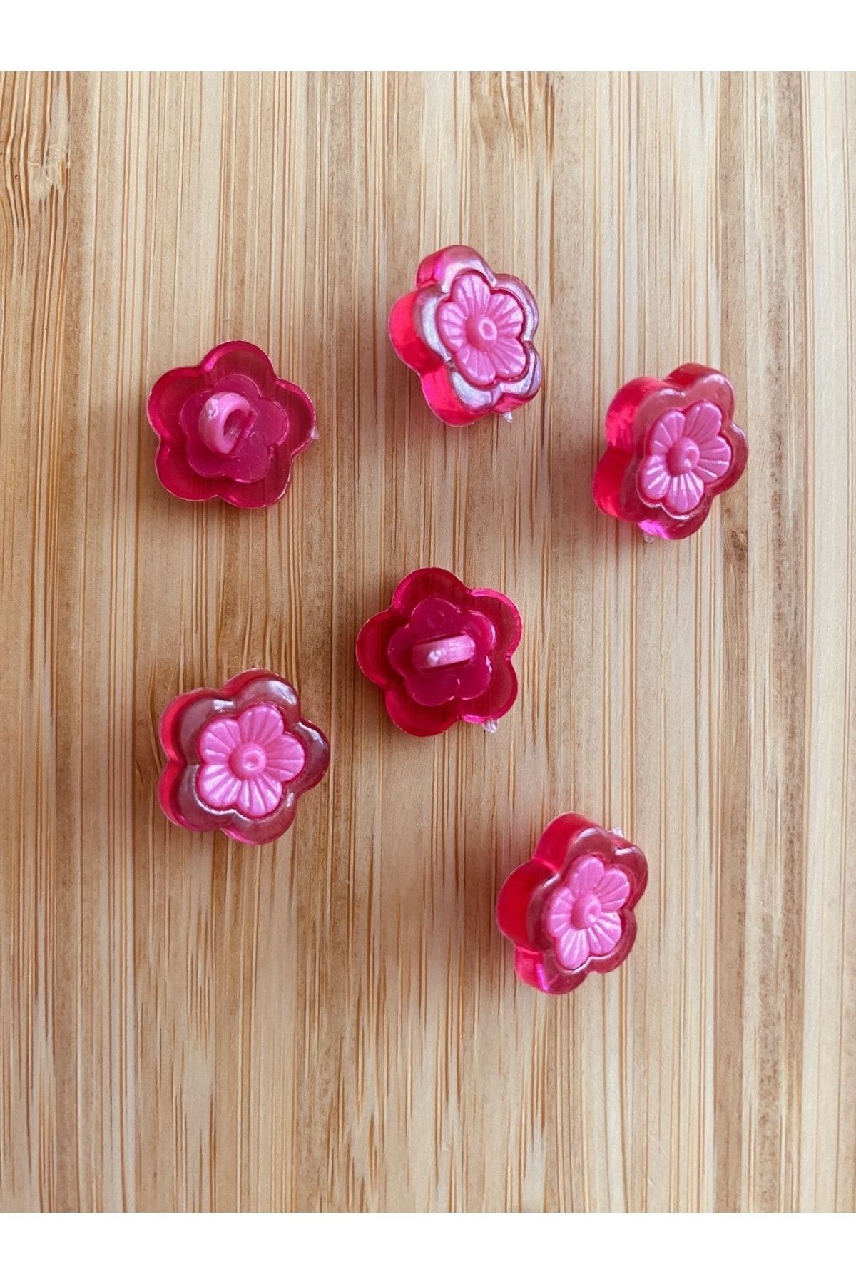 Alttan dikmeli şeffaş plastik papatya bebek düğmesi. 1.5cm. 6'lı paket.