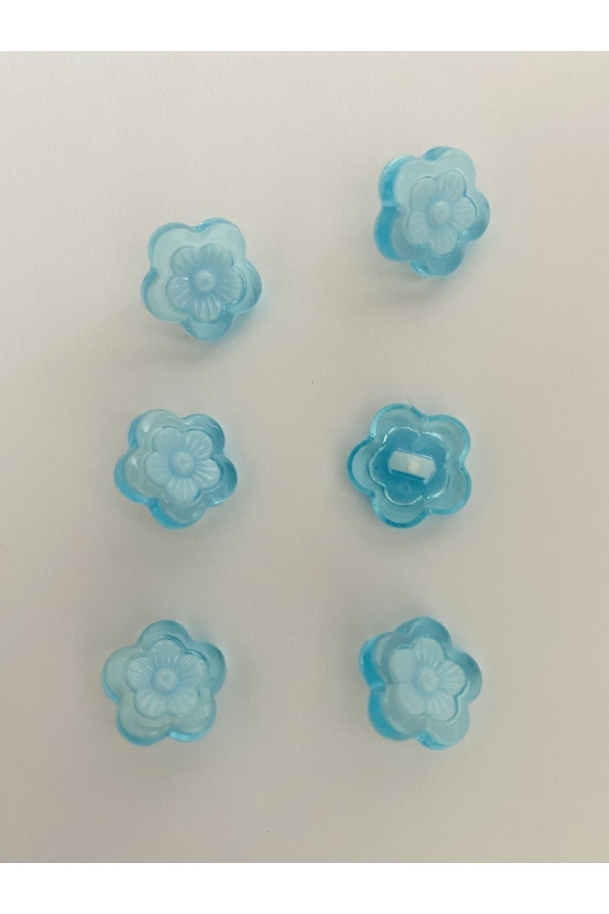 Alttan dikmeli şeffaş plastik papatya bebek düğmesi. 1.5cm. 6'lı paket.