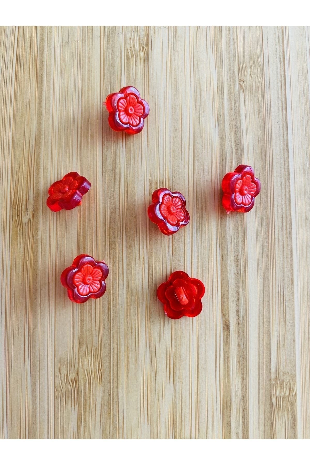 Alttan dikmeli şeffaş plastik papatya bebek düğmesi. 1.5cm. 6'lı paket.