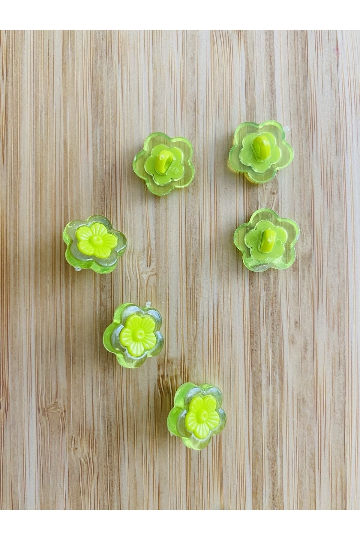 Alttan dikmeli şeffaş plastik papatya bebek düğmesi. 1.5cm. 6'lı paket.