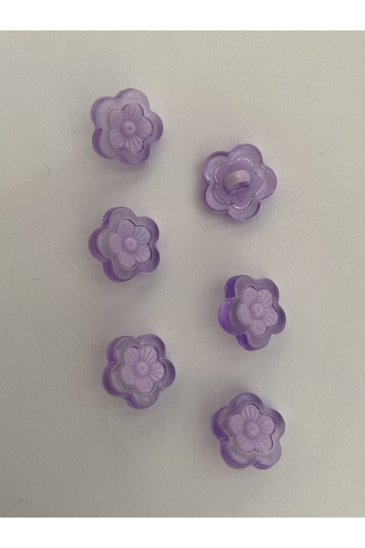 Alttan dikmeli şeffaş plastik papatya bebek düğmesi. 1.5cm. 6'lı paket.