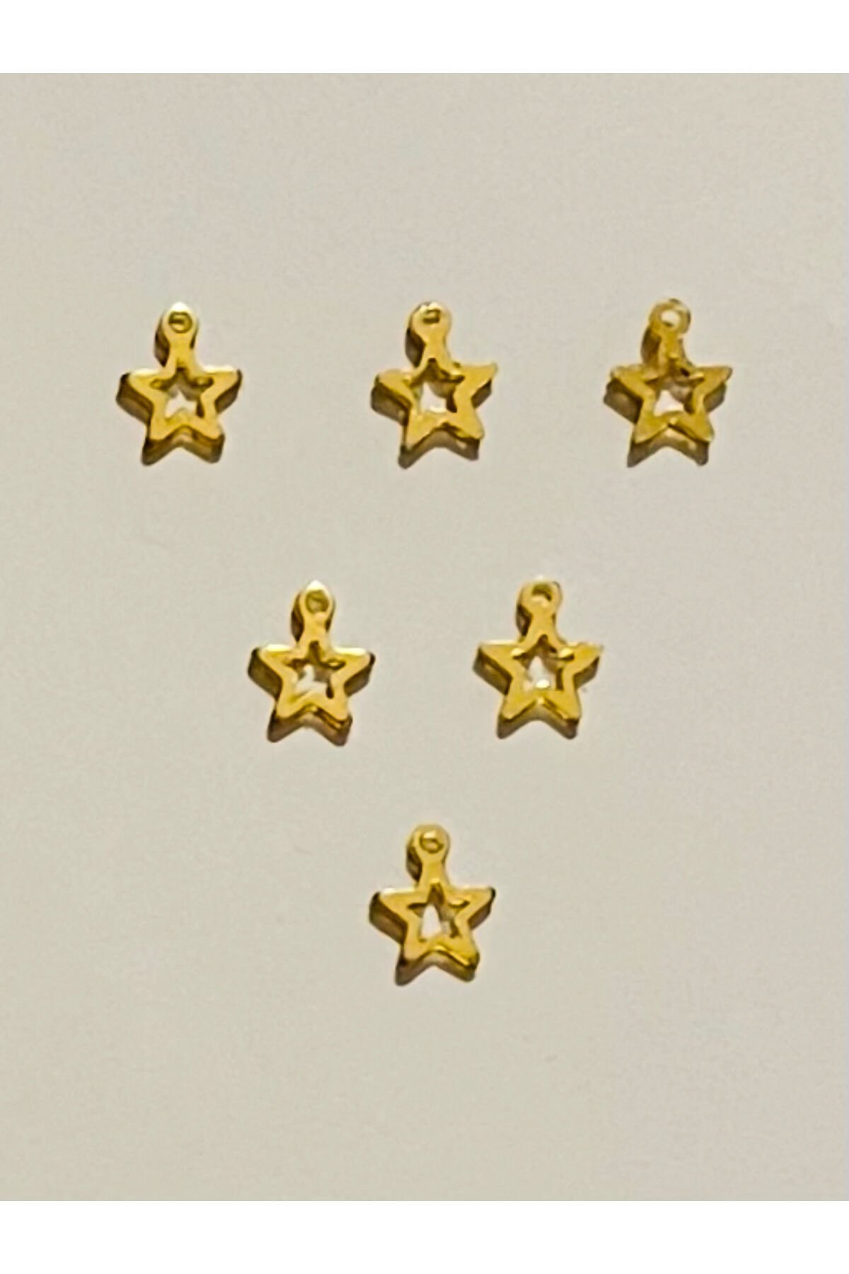 İçi Boş yıldız. Pleksi Oya Ve Işleme Pulu. 15gr. Tahmini 340 Ad. Gold.