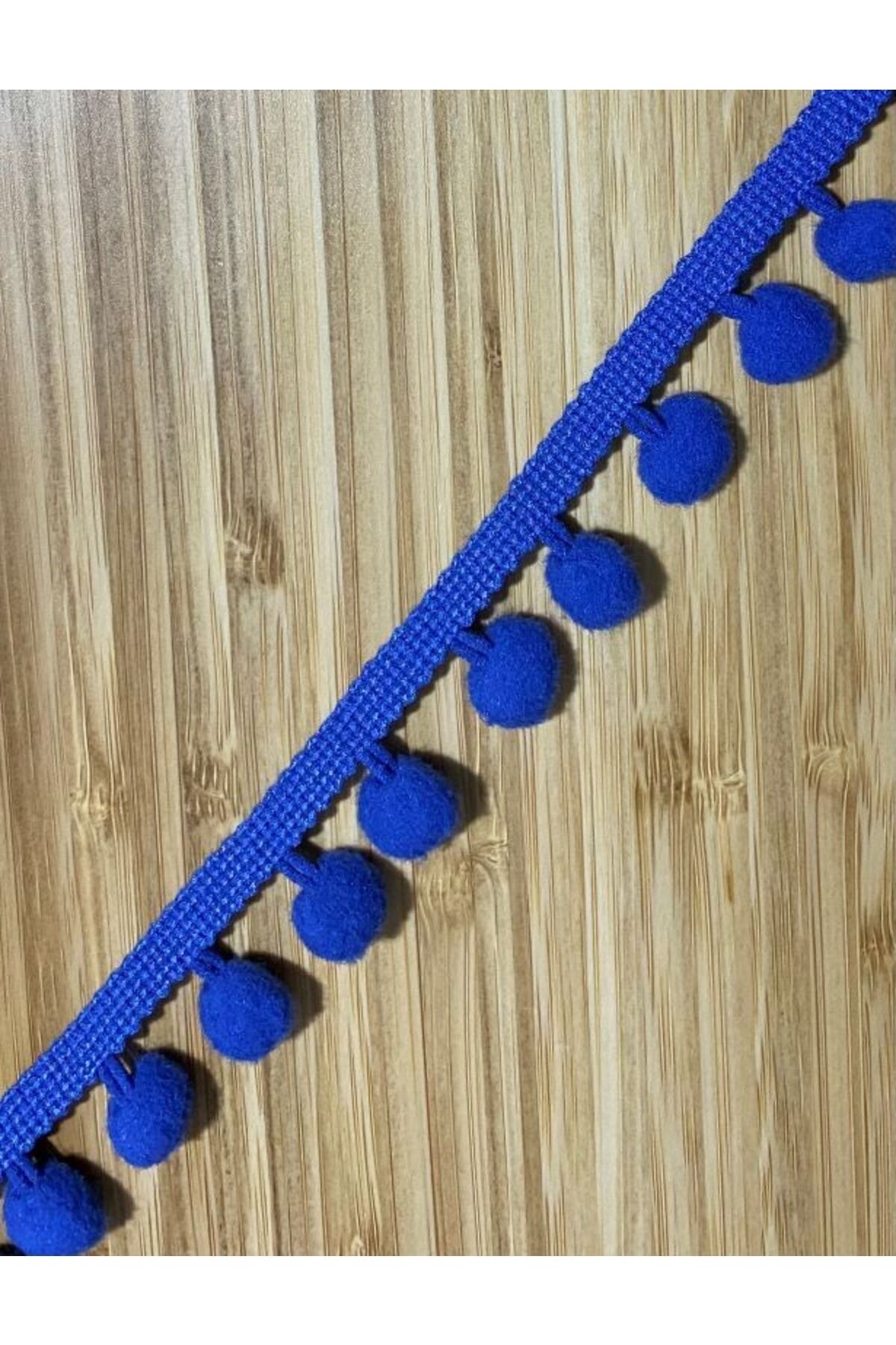 Sıralı Şerit Ponpon. Ponpon:1,3cm. Şerit:7mm. Saks Mavi. 4metre.