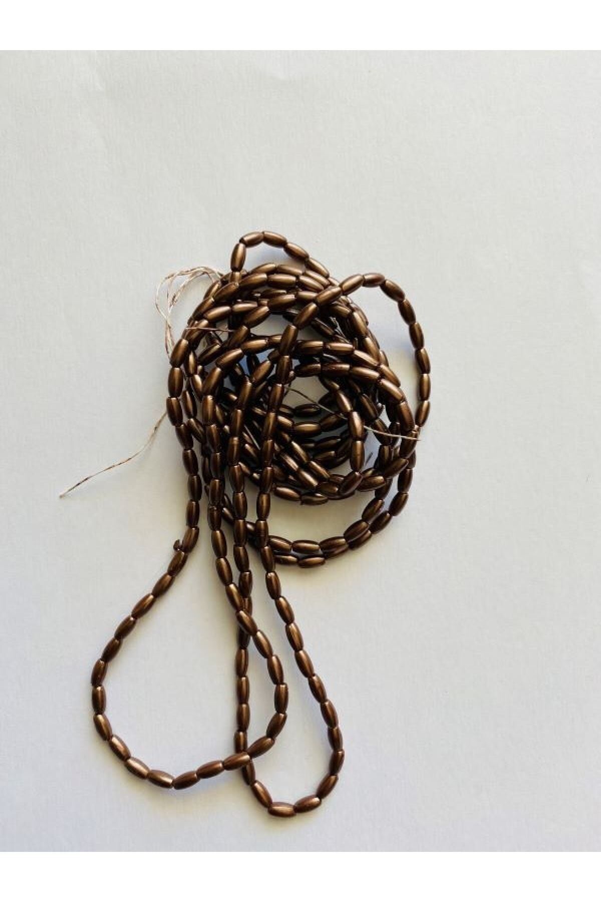 Arpa Boncuk 3x6cm. Kahve 2 Dizi