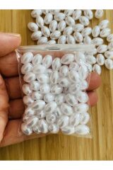 Barok Takı İnci. Arpa modeli. 25gr. Tahmini 70 adet civarında. Beyaz.