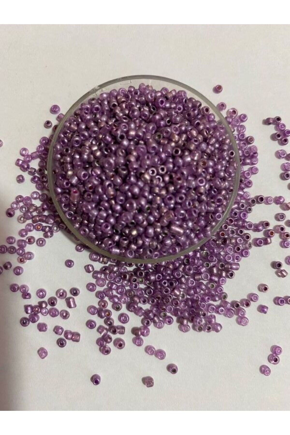 Kum Boncuk No:2. Renk: Eflatun. 37-40 Gram.